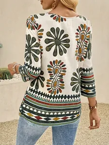Back view of bohemian print top with mid-length sleeves and floral paisley pattern