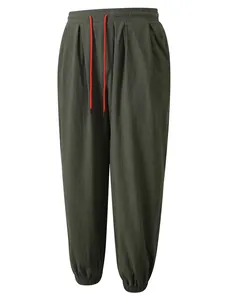 Pantalones casuales de algodón y lino para hombre con cintura elástica y cordón ajustable.