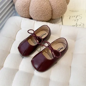 Elegant deep red French style Mary Jane shoes for girls with delicate bow tie detail