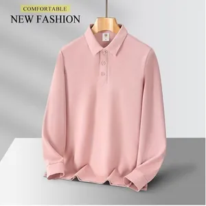 Detail view of a men's long-sleeved pink polo shirt with a classic button-down collar