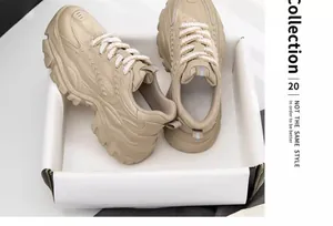 Women's chunky beige Dad sneakers in a white display box, trendy platform sport shoes