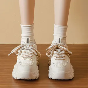 Women's thick-soled chunky white sneakers with platform design and braided laces