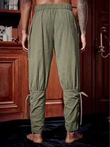 Back view of mens vintage pirate trousers featuring adjustable lace-up ankle cuffs