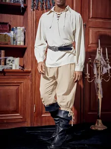 Vintage men's pirate pants with lace-up ankle details and beige linen-like fabric