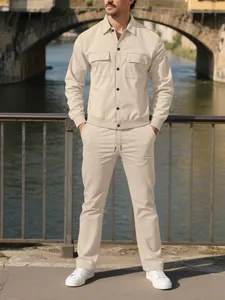 Full body view of a beige corduroy two-piece set featuring a jacket and matching trousers.