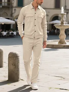 Full-body view of men's beige corduroy two-piece set featuring a button-down shirt and pants.