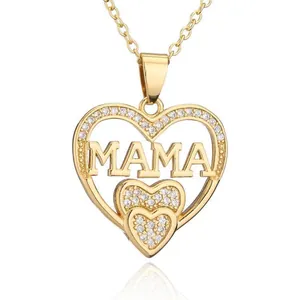 Detailed view of a gold-plated heart pendant necklace with zircon stones and MAMA text.