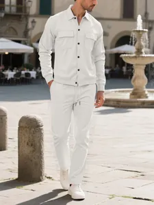 Men's off-white corduroy leisure set featuring double pockets and button lapel detail.