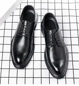 Close-up of elegant black pointed-toe business dress shoes for men in British style