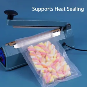 Sacs alimentaires dépolis à fermeture par pression avec scelleuse thermique manuelle.