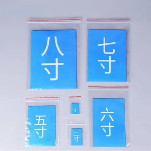 Transparent resealable plastic bags in various sizes for ID photos and small items