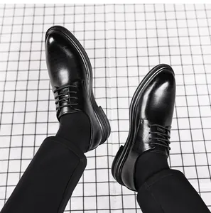 Detailed view of black British style business shoes with textured leather finish