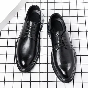 Elegant men's black pointed-toe business dress shoes for formal wedding occasions.