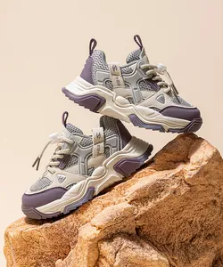 Chunky kids sneakers in purple and grey with breathable mesh and drawstring toggle.