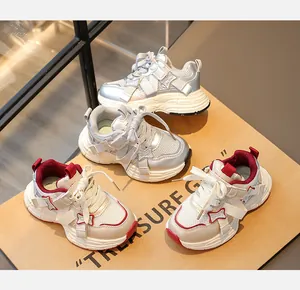 Stylish breathable sneakers for girls with chunky anti-slip soles in silver and cream.