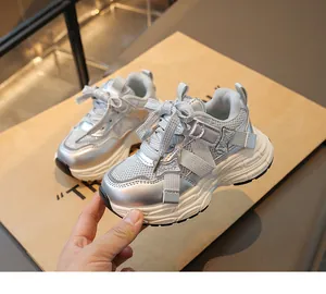 Side detail view of silver girls chunky sneakers with mesh and synthetic leather