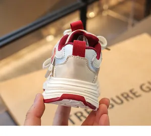 Detailed heel view of stylish girl's breathable chunky sneakers with non-slip red sole
