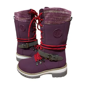 Side view of purple mid-calf knight boots with red laces and decorative buckle.