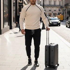 Detail showing men's casual white coral fleece sweatshirt and black joggers outfit set