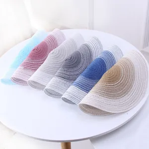 Set of Nordic gradient woven placemats in various colors for dining table decor