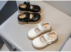 Elegantes zapatos Lolita de cuero para niñas en blanco y negro con lazo y encaje
