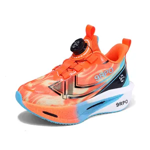Boys' breathable orange athletic shoes featuring a convenient rotary buckle closure system
