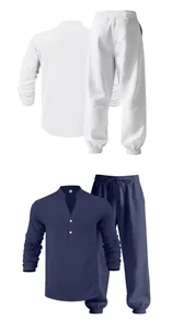 Close-up view of navy blue and white linen long-sleeve Henley shirt and pants sets
