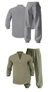 Detailed view of men's linen-textured Henley long-sleeve shirt and matching trousers set