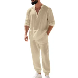 Men's loose linen Henry shirt and pants set for casual home and beach wear.