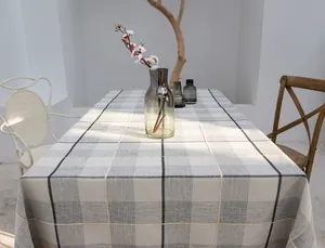 Elegant grau-weiß karierte Tischdecke aus Baumwollleinen in einem minimalistischen Design