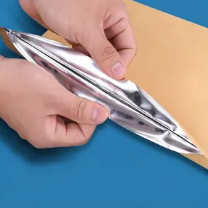 Durable reusable aluminized foil kraft paper tea bag featuring a secure self-sealing zipper
