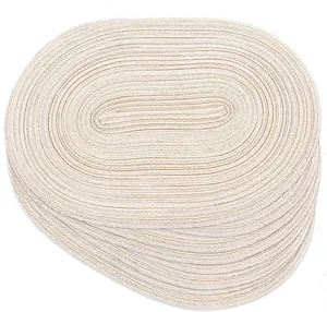 Pila de manteles individuales ovalados minimalistas de cuerda de algodón blanco