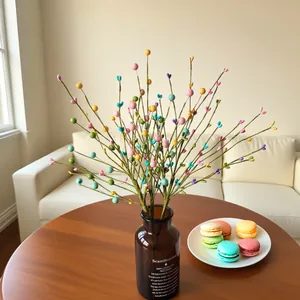 Colorful foam heart berry stems in a vase for aesthetic home decor