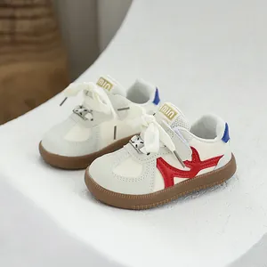Toddler German trainer sneakers with soft sole and stylish red accents