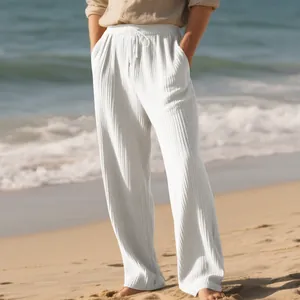 Detailed view of white jacquard striped wide-leg men's pants with drawstring waist
