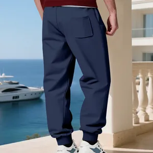 Back view of men's navy blue fleece-lined joggers for winter travel and leisure