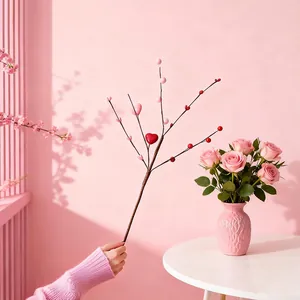 Detailed view of artificial heart berry branch decoration for festive home interior decor