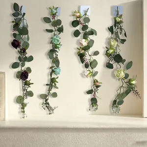 Four artificial eucalyptus and rose flower vine garlands for elegant wall decor