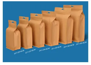 Detail view of brown kraft paper stand-up pouches in six different sizes on blue background