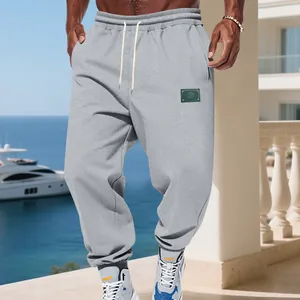 Men's American-style grey fleece sweatpants with drawstring waist and elastic jogger cuffs