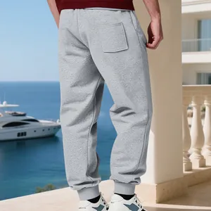 Rear view detail of grey fleece-lined men's joggers featuring a functional back pocket