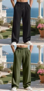 Men's wide-leg ribbed casual pants in black and olive green with drawstring waist detail.