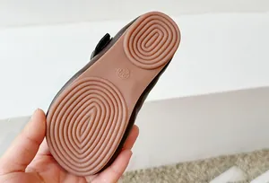 Close-up showing the durable anti-slip rubber sole texture of soft girls leather flats