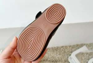 Close-up view of flexible non-slip rubber sole for toddler girls princess leather shoes