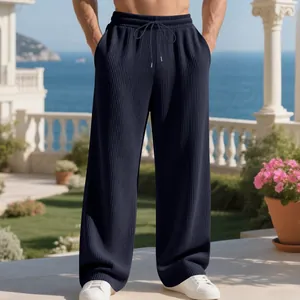 Premium men's loose navy trousers featuring vertical rib texture and drawstring waist