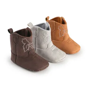 Trois paires de bottes de cowboy souples pour bébé aux couleurs neutres de base