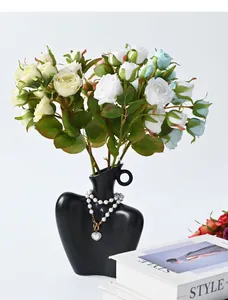 Detailed view of 8-head artificial roses with oil painting style burnt edges