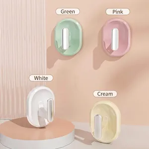 Set of 4 colorful self-adhesive wall hooks for home storage and organization