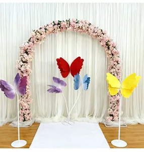 Large gradient felt butterflies with stands for wedding venue decoration and event setup