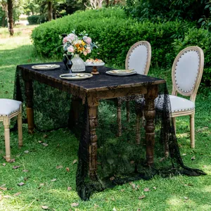 Elegant black floral lace tablecloth with intricate patterns for outdoor garden parties